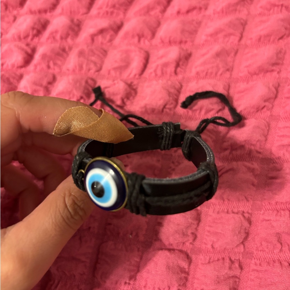 Black Adjustable Bracelet with Blue Eye Charm